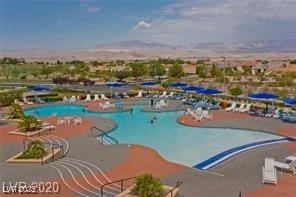 view of pool featuring a patio area