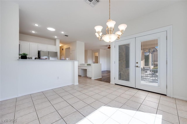 interior space featuring light tile patterned floors, visible vents, french doors, a chandelier, and recessed lighting