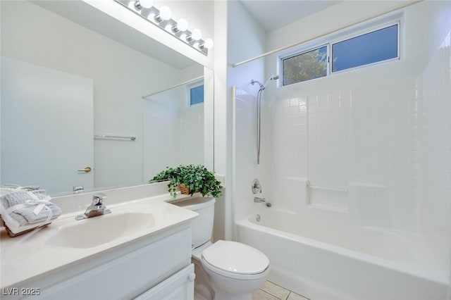 full bath featuring toilet, tile patterned floors, bathing tub / shower combination, and vanity