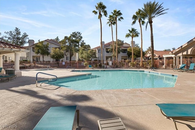 view of pool featuring a patio area