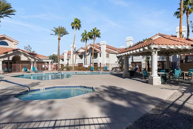 view of pool with a patio area and a pergola