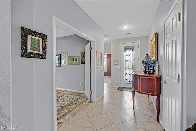 view of tiled entrance foyer