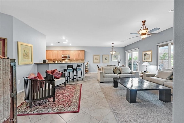 living room featuring ceiling fan