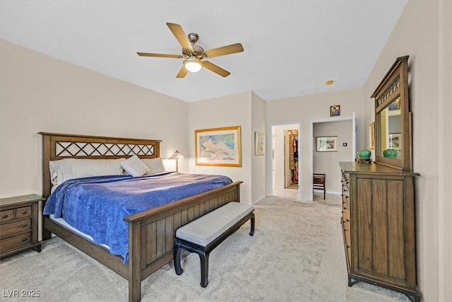 bedroom featuring ceiling fan and light colored carpet