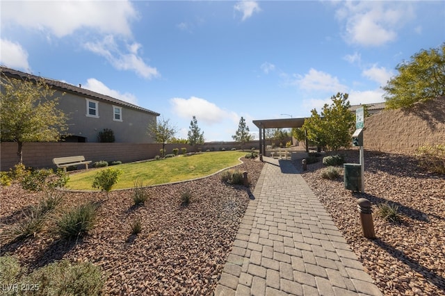 exterior space featuring a patio and a lawn