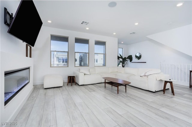 living room featuring light wood-type flooring