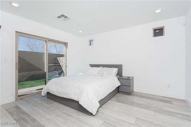 bedroom featuring access to outside