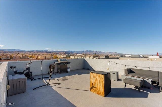 view of patio / terrace with a mountain view