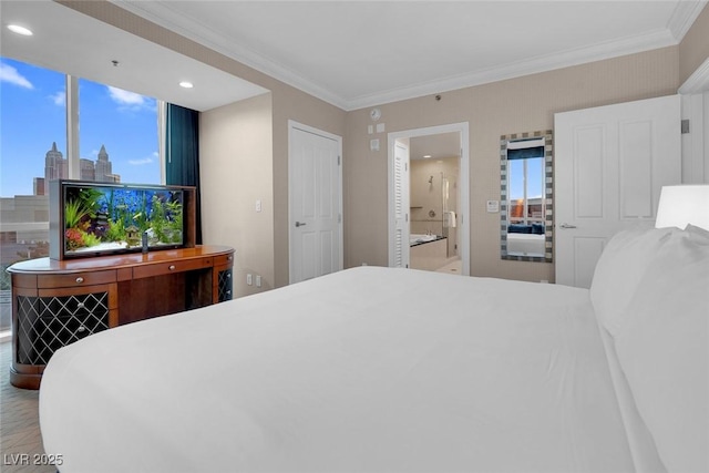 bedroom with recessed lighting, multiple windows, crown molding, and ensuite bathroom