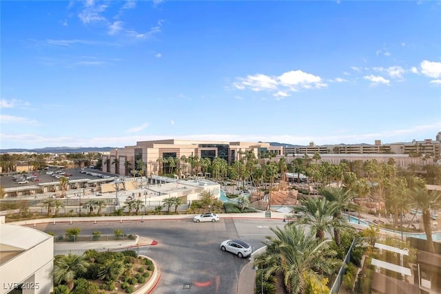 birds eye view of property with a city view