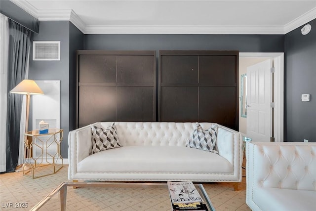 sitting room with light floors, visible vents, and crown molding