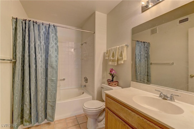 full bathroom with tile patterned flooring, shower / tub combo, vanity, and toilet