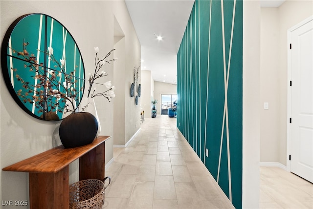 hallway with light tile patterned floors