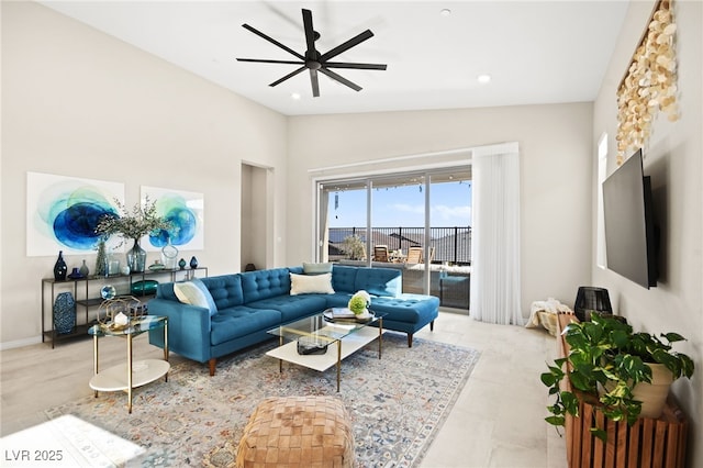 living room with lofted ceiling and ceiling fan