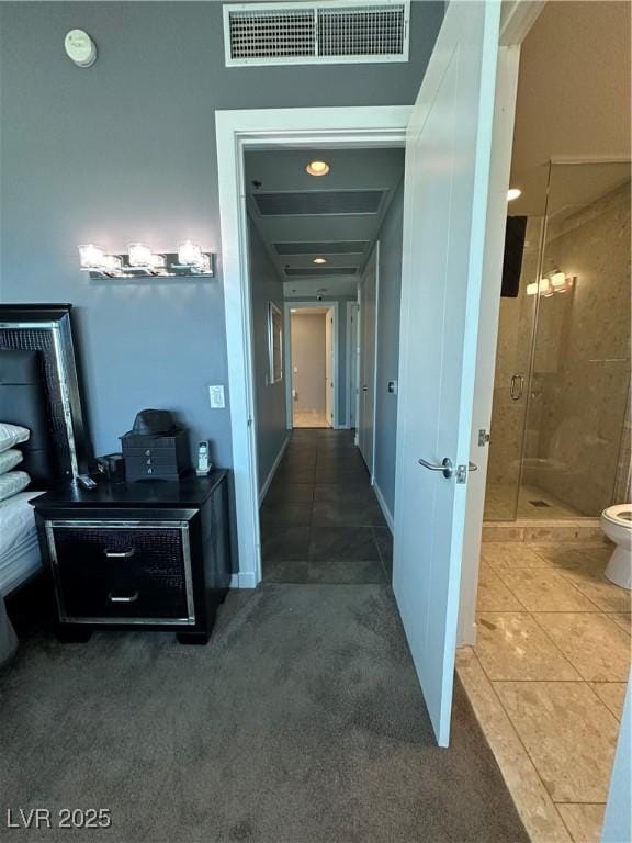 hallway featuring tile patterned floors