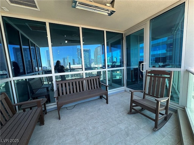 view of patio / terrace with a balcony