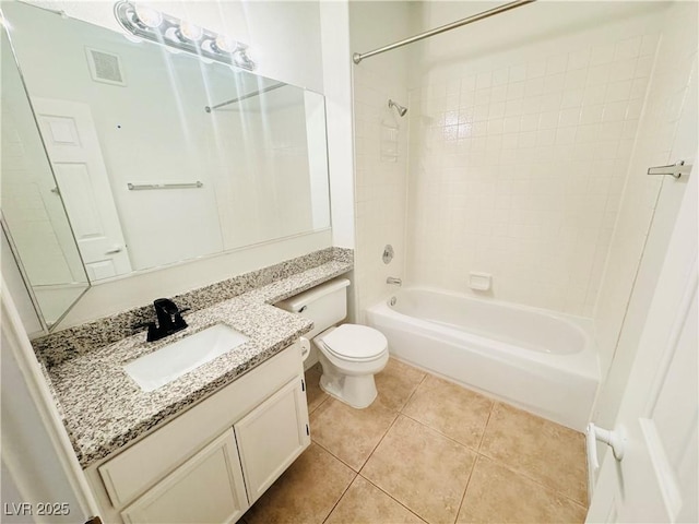 full bathroom with tile patterned flooring, vanity, tub / shower combination, and toilet