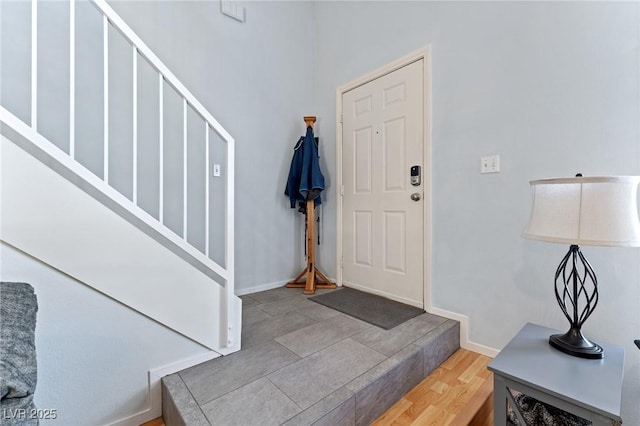 foyer entrance featuring hardwood / wood-style floors