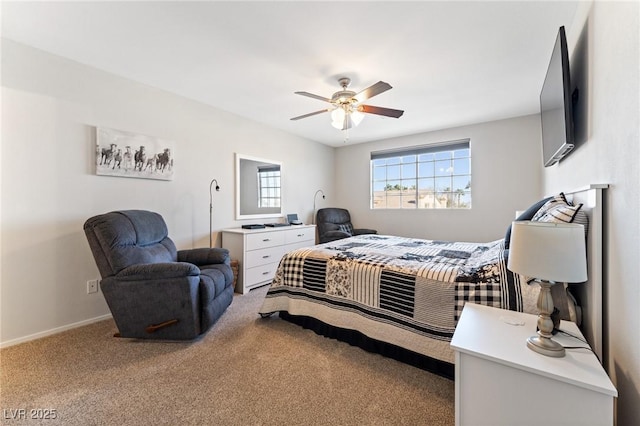 bedroom with ceiling fan and carpet flooring