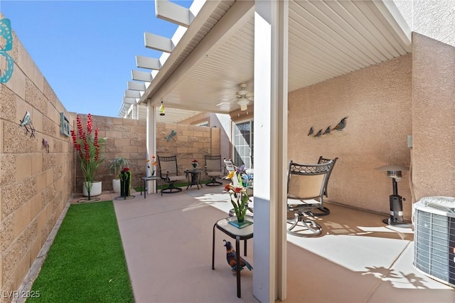 view of patio / terrace with cooling unit and ceiling fan