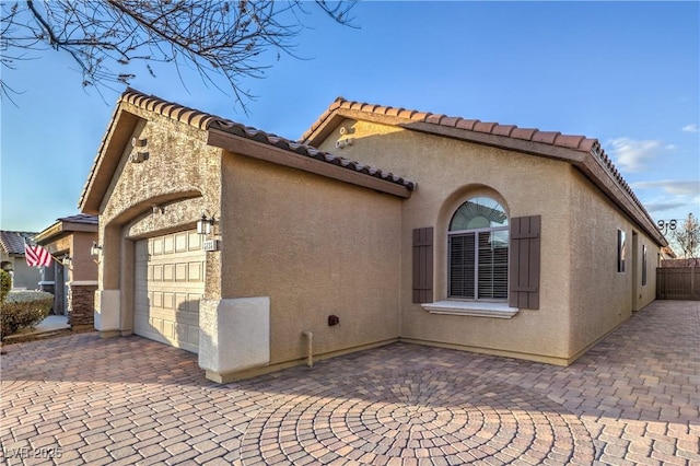 view of home's exterior featuring a garage