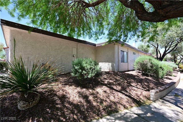 3126 Asoleado Cir, Las Vegas, NV 89121 - view of home's exterior with stucco siding
