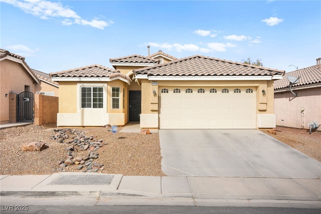 view of front of property with a garage