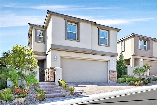 view of front of property with a garage