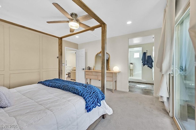 bedroom featuring light colored carpet and ceiling fan