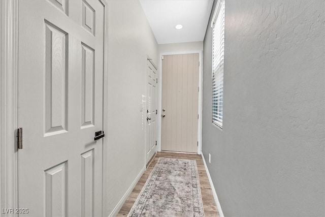 hall featuring light wood-type flooring