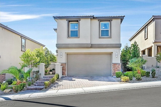 view of front of property with a garage