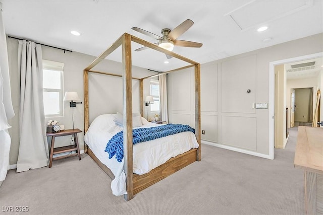 bedroom featuring light carpet and ceiling fan