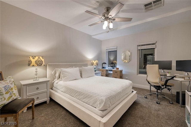 bedroom with ceiling fan and dark carpet