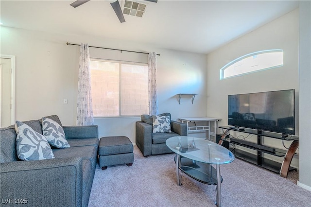 living room with light colored carpet and ceiling fan