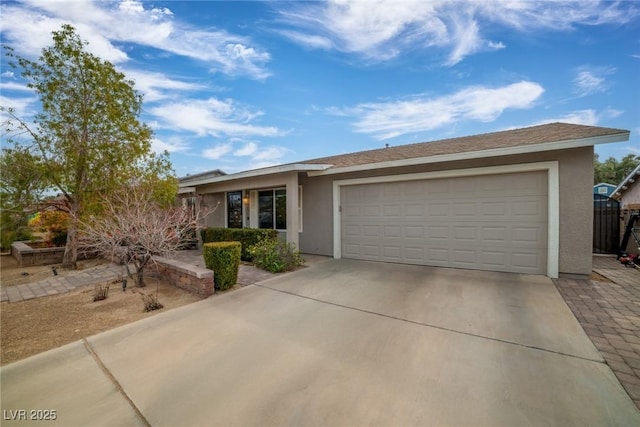 single story home featuring a garage