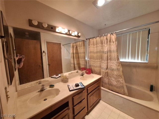 bathroom featuring tile patterned floors, vanity, and shower / tub combo