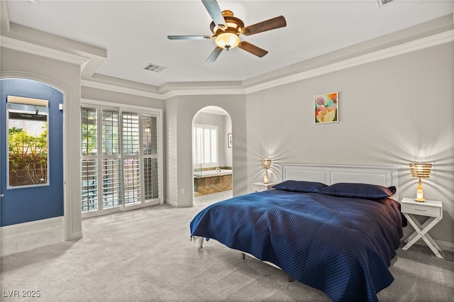 carpeted bedroom featuring ceiling fan, ornamental molding, connected bathroom, and access to outside