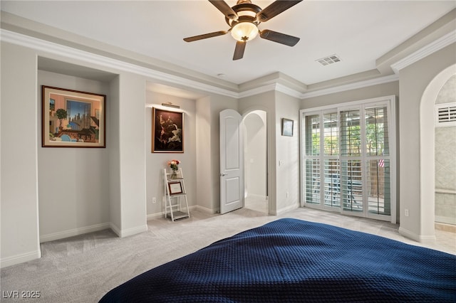 unfurnished bedroom with light carpet, crown molding, and ceiling fan