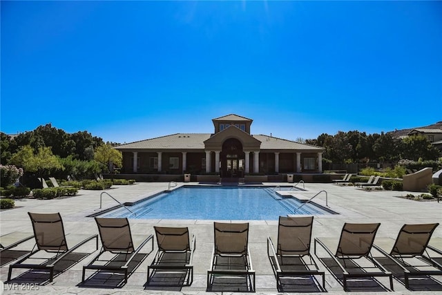 view of swimming pool featuring a patio