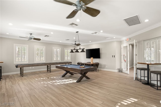 playroom with a healthy amount of sunlight, billiards, and light hardwood / wood-style flooring