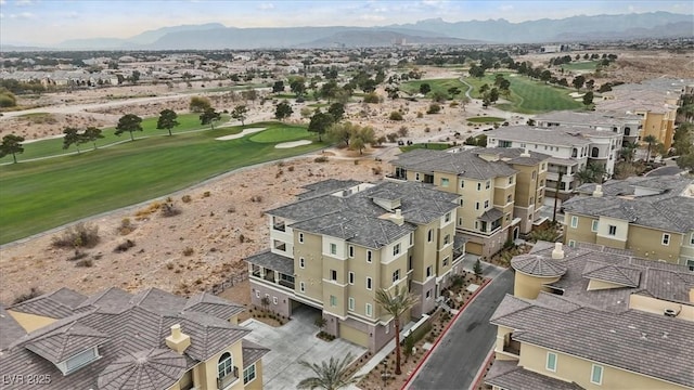 birds eye view of property featuring a mountain view