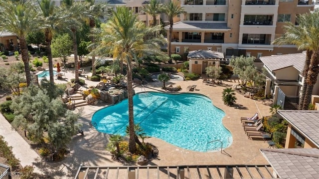 view of swimming pool featuring a patio