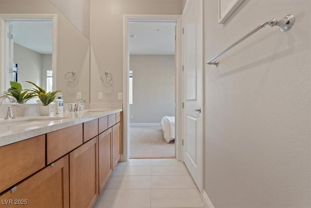 bathroom featuring vanity and tile patterned flooring