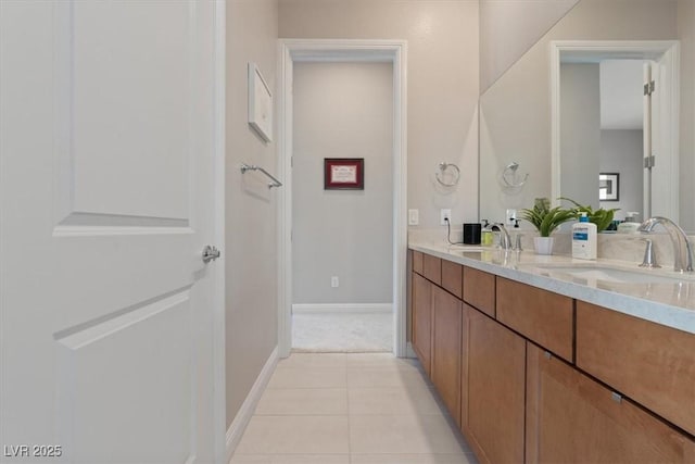 bathroom with vanity and tile patterned floors