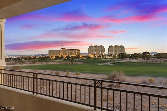 view of balcony at dusk