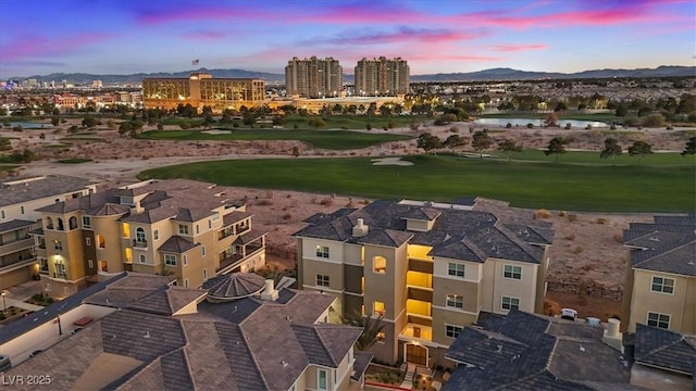 aerial view at dusk with a mountain view