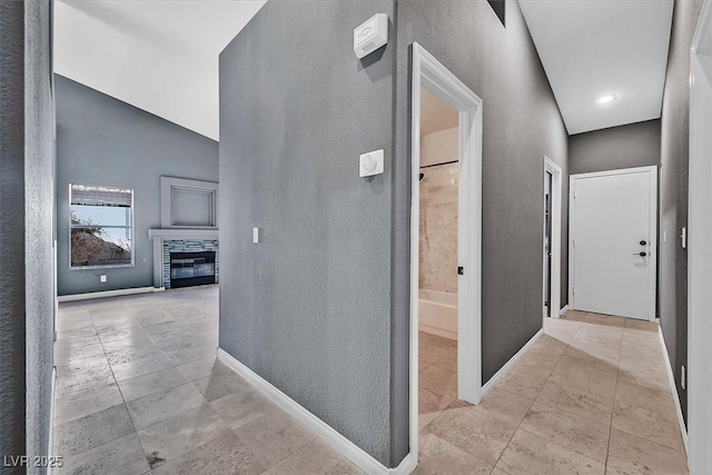 hallway with light tile patterned floors