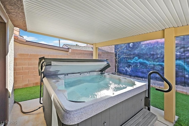 view of patio / terrace featuring a hot tub