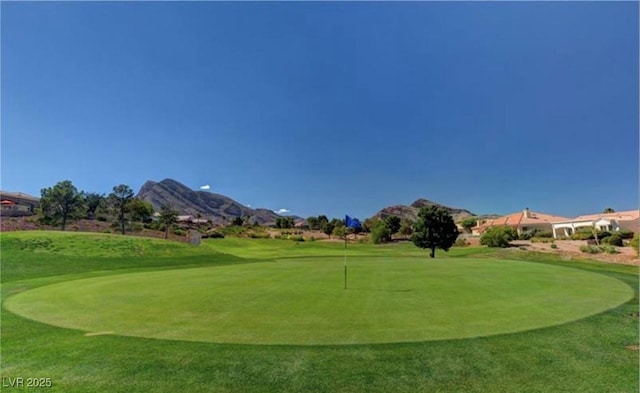 view of community featuring a mountain view and golf course view