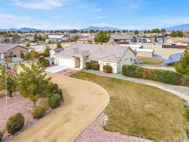 birds eye view of property featuring a mountain view